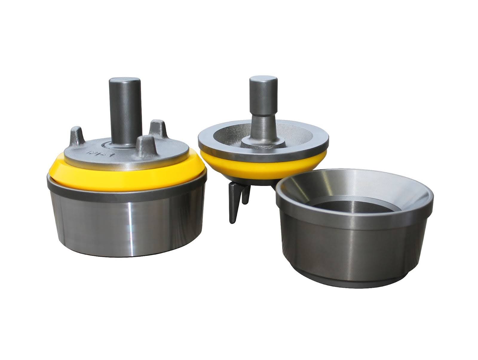 Set of three pipe repair clamps with yellow rubber gaskets and gray metal tops, laid out for fitting and sealing pipes